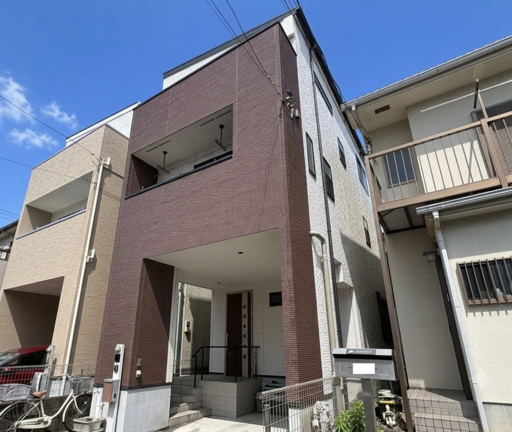 石目調×濃色で魅せる外装リフォーム